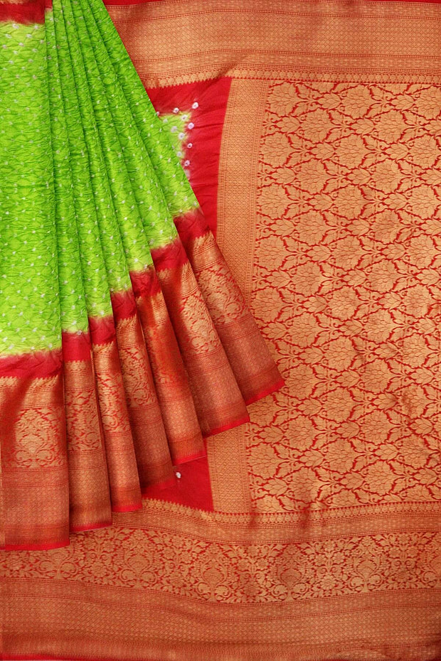 Bandhini pure silk saree in green with Kanchi patterned  border