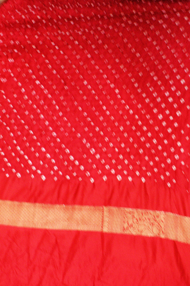 Bandhini pure silk saree in green with Kanchi patterned  border