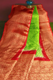 Bandhini pure silk saree in green with Kanchi patterned  border