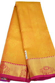 Kanchi silk brocade saree in yellow with contrast pallu in pink