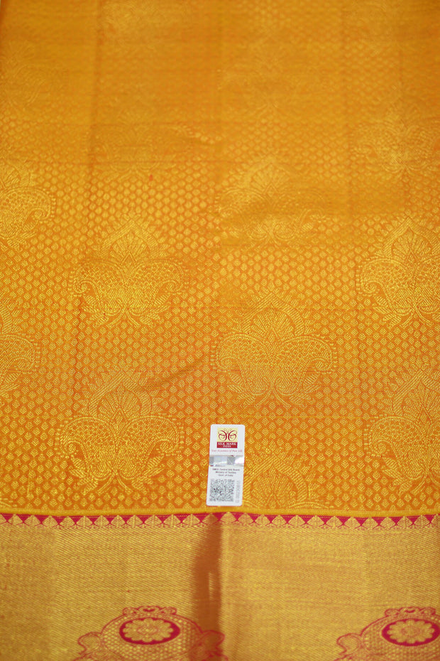 Kanchi silk brocade saree in yellow with contrast pallu in pink