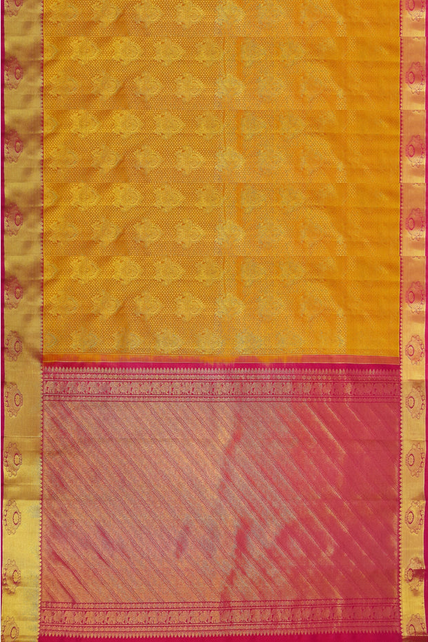 Kanchi silk brocade saree in yellow with contrast pallu in pink