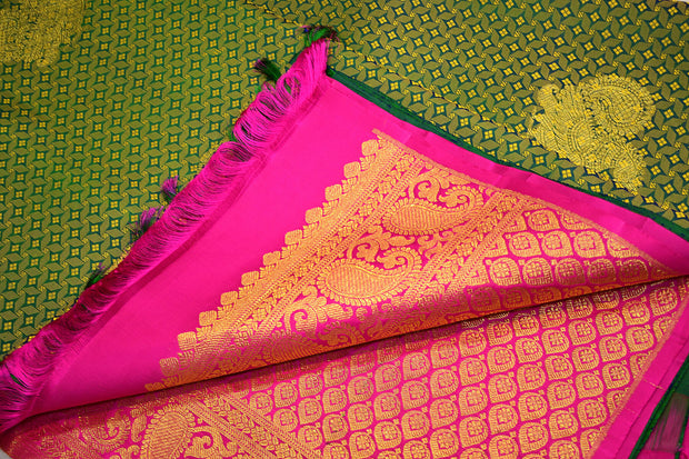 Handwoven Kanchi  pure silk saree  with peacock motifs.
