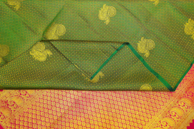 Handwoven Kanchi  pure silk saree  with peacock motifs.