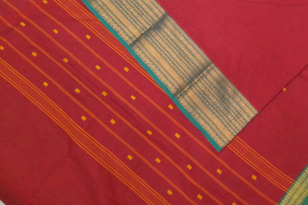 Kanchi pure cotton saree in rust with small buttis