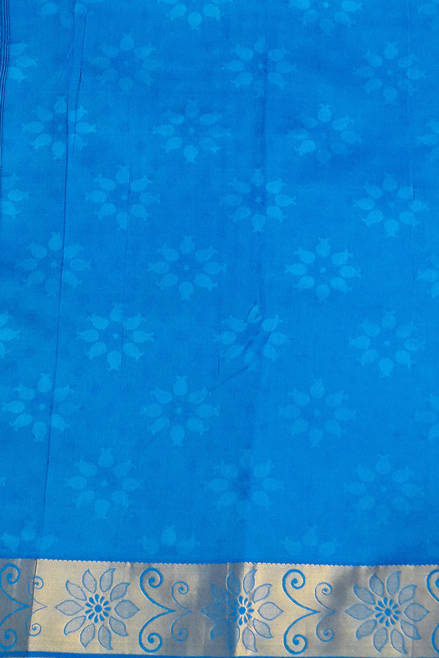 Kanchi pure silk saree in blue with floral motifs .