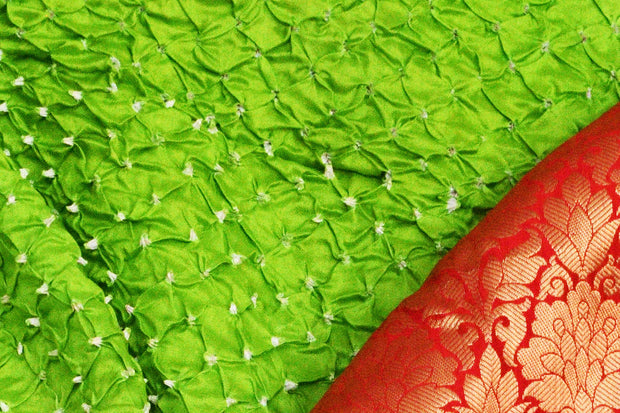 Bandhini pure silk saree in green with Kanchi patterned  border