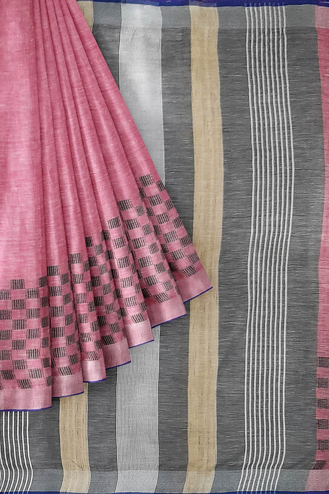 Pure linen saree in pink with a patterned skirt border & a striped pallu