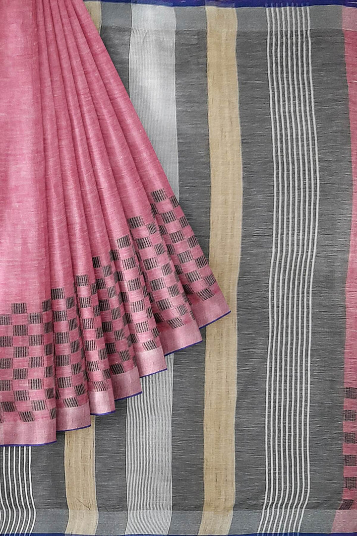 Pure linen saree in pink with a patterned skirt border & a striped pallu