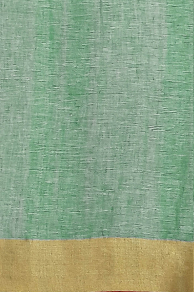 Pure linen saree in green with a pattern on the bodyr & a striped pallu