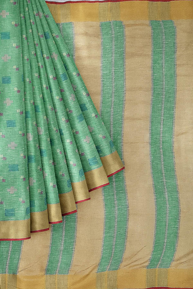 Pure linen saree in green with a pattern on the bodyr & a striped pallu