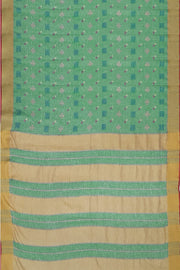 Pure linen saree in green with a pattern on the bodyr & a striped pallu