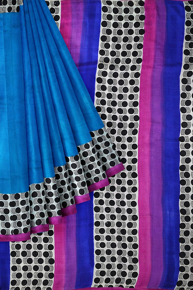 Printed  pure silk saree in  blue with patterned  borders & pallu