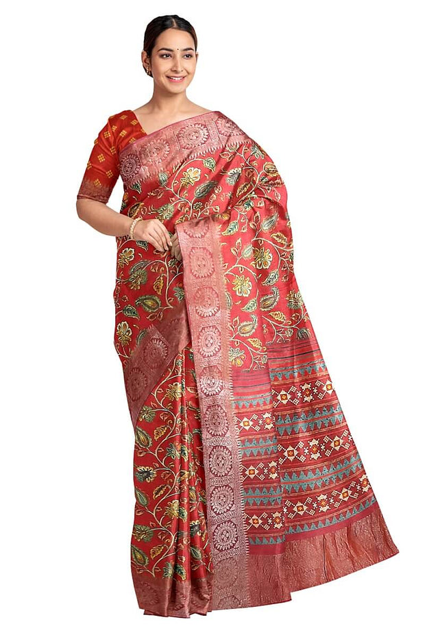 Handwoven moonga silk saree with equally beautiful woven zari border and the red color kalamkari looks  beautiful.