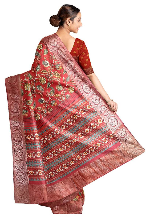 Handwoven moonga silk saree with equally beautiful woven zari border and the red color kalamkari looks  beautiful.