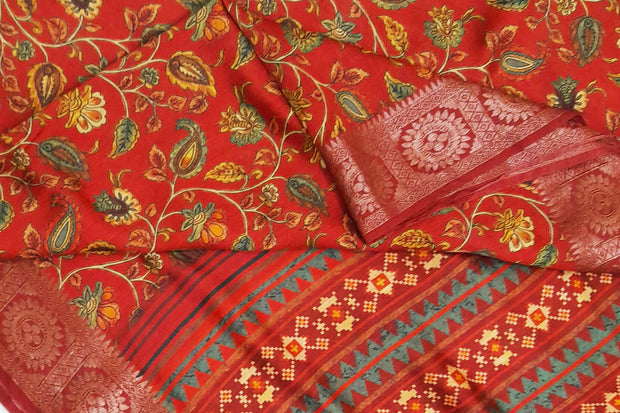 Handwoven moonga silk saree with equally beautiful woven zari border and the red color kalamkari looks  beautiful.
