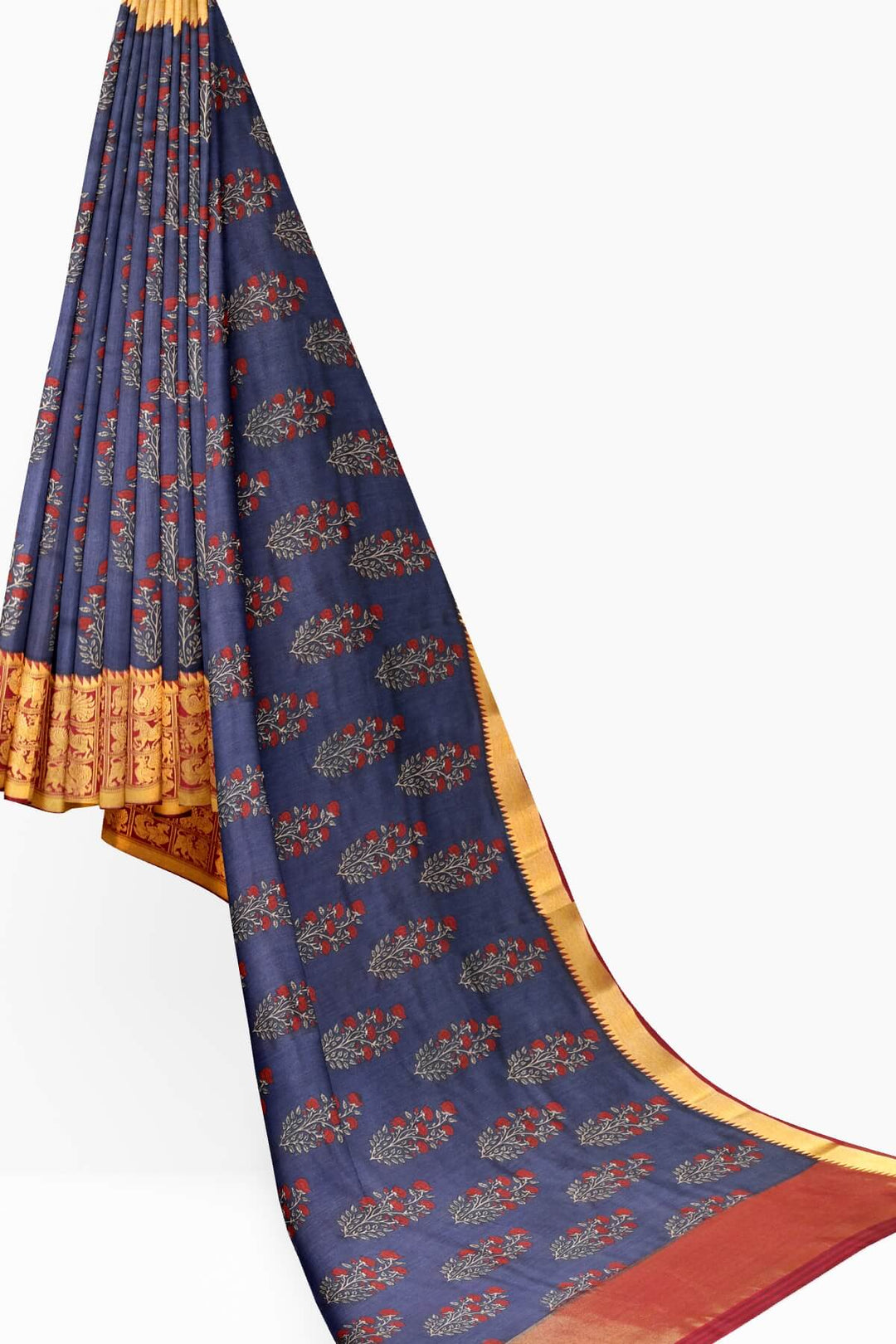 An  electric blue shade moonga silk saree with  copper red weaved zari border.