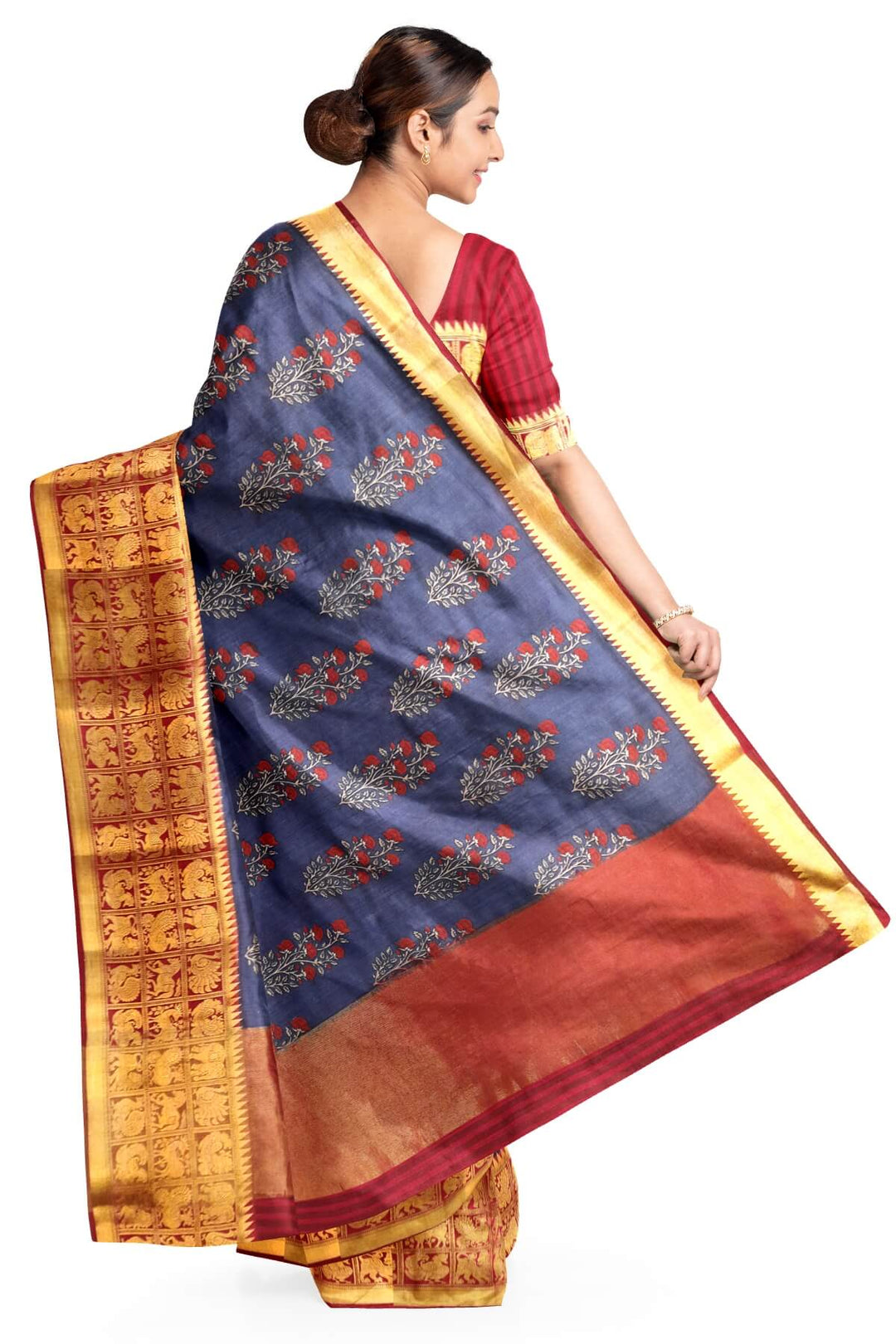 An  electric blue shade moonga silk saree with  copper red weaved zari border.