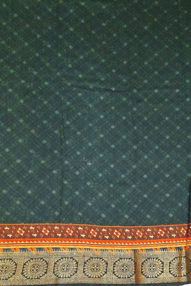 Deep grey Patan Patola printed saree on moonga silk.