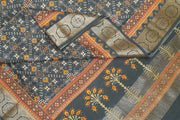 Deep grey Patan Patola printed saree on moonga silk.