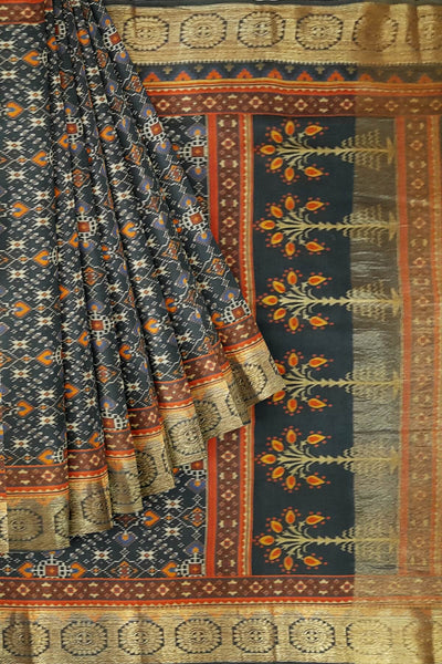 Deep grey Patan Patola printed saree on moonga silk.