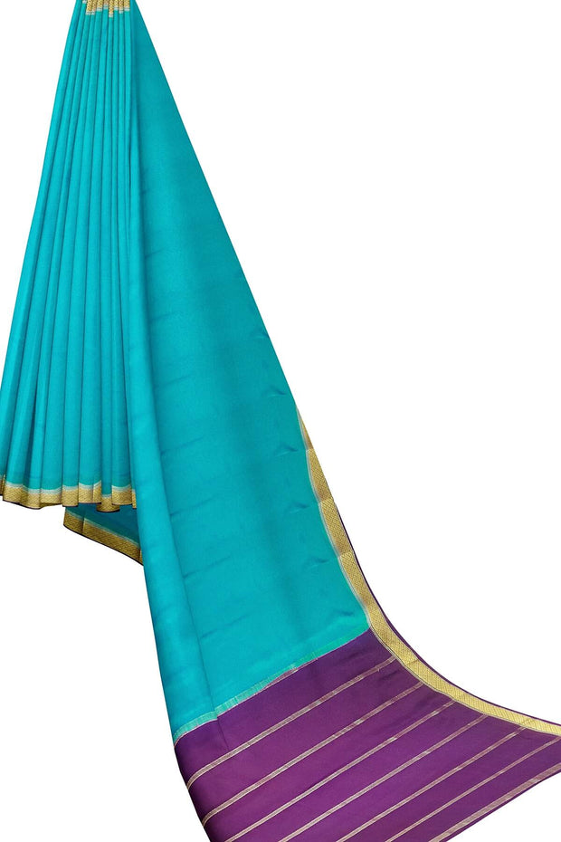 Mysore  crepe  silk saree in  blue  with contrast pallu in purple
