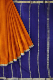 Mysore  crepe  silk saree in rust  with  contrast pallu in blue