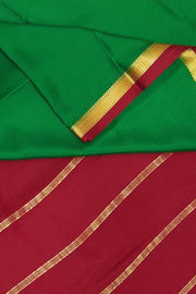 Mysore  crepe  silk saree in  green  with contrast pallu in red
