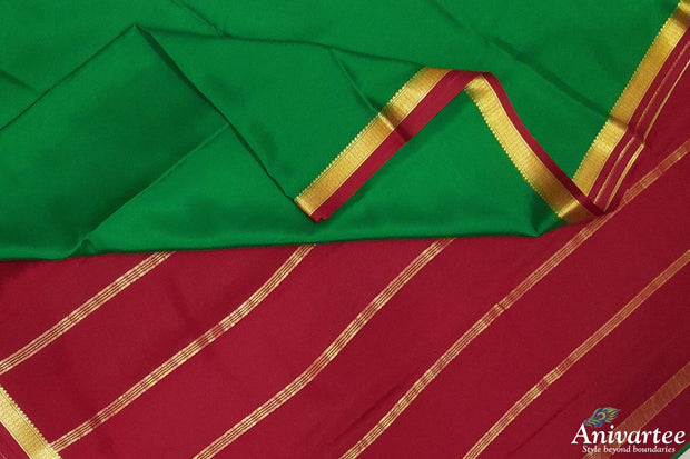 Mysore  crepe  silk saree in  green  with contrast pallu in red