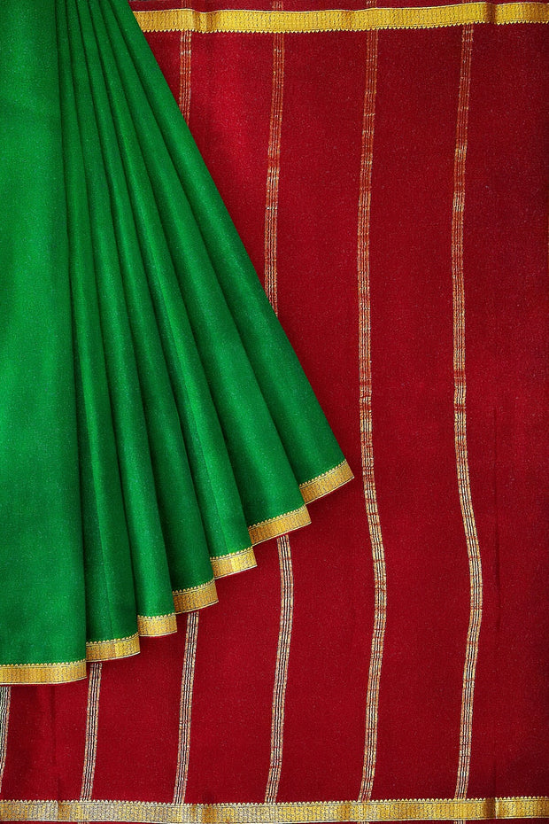 Mysore  crepe  silk saree in  green  with contrast pallu in red