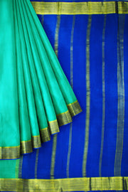 Mysore crepe silk saree in pool blue with a  contrast pallu