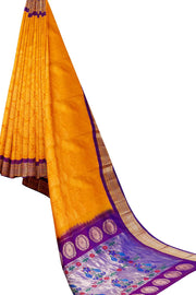 Handwoven Paithani pure silk brocade saree in mustard with round motifs and  a contrast pallu