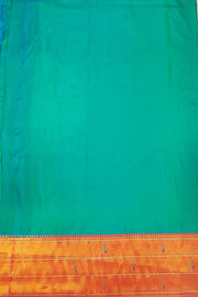 Paithani pure silk saree in teal green with small buttis all over the body and with colourful lotus motifs in gold pallu.