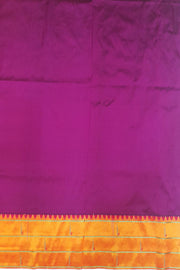 Paithani pure silk saree in purple with small  buttis all over the body.