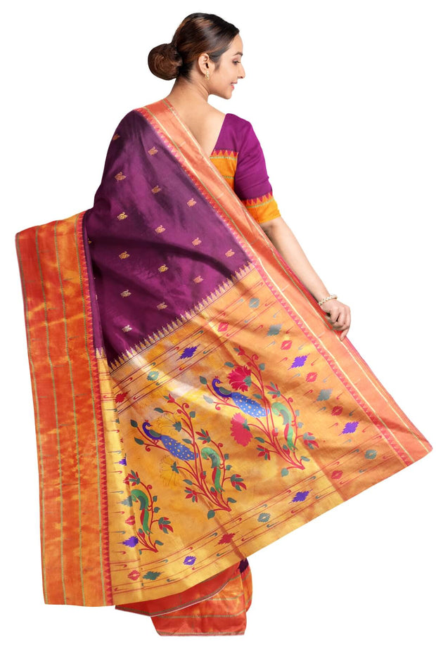 Paithani pure silk saree in purple with small  buttis all over the body.