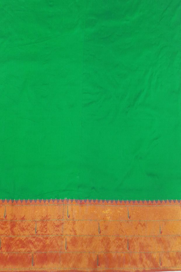 Paithani pure silk saree in green with small buttis all over the body