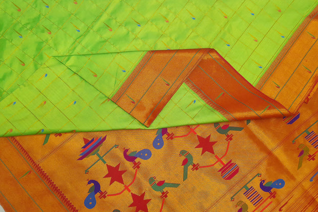 Paithani pure silk saree   in green with muniya motifs in zari checks all over the body.