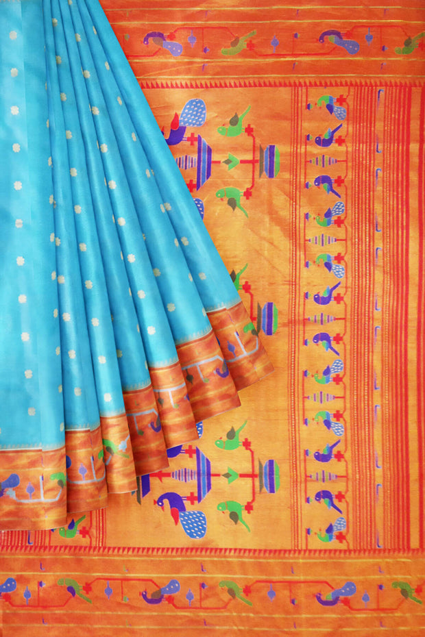 Paithani pure silk saree in sky blue  with small buttis all over the body and with colourful parrot &  peacock  motifs in  pallu.