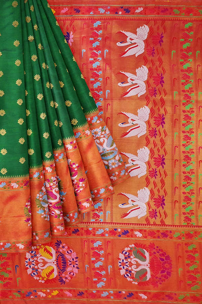 Paithani pure silk saree in green with small buttis all over the body .