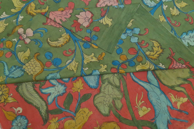 Handrawn hand painted pen kalamkari pure silk saree in green with flora & fauna  and animal motifs in pallu