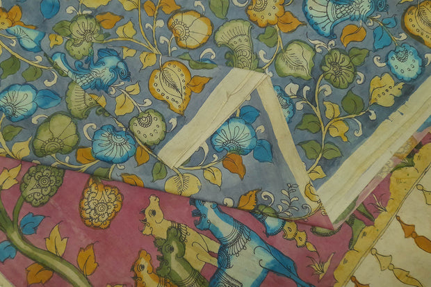 Hand drawn hand painted vegetable dye based  pen kalamkari pure silk saree in bluish grey with floral  pattern.