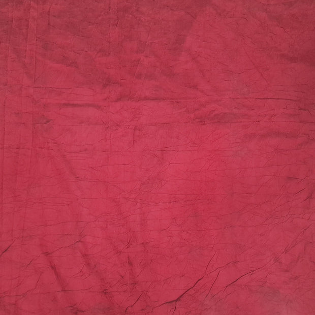 Crushed silk fabric in maroon