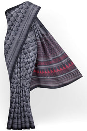 Printed pure silk saree  in black  in  small floral pattern in pallu