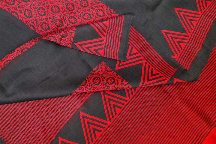 Printed pure silk saree in red & black with floral motifs , temple border and without blouse