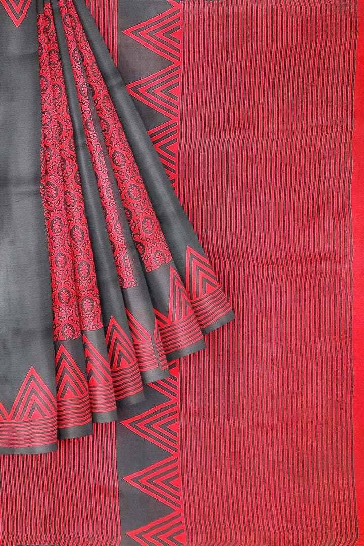 Printed pure silk saree in red & black with floral motifs , temple border and without blouse