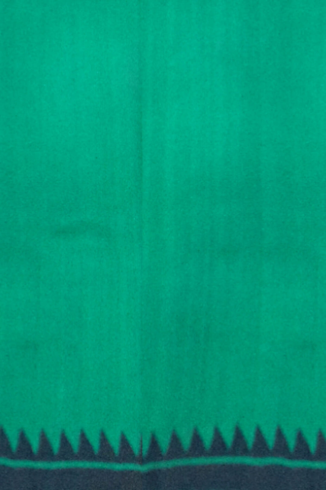 Printed pure silk saree in teal green with paisley motifs all over.