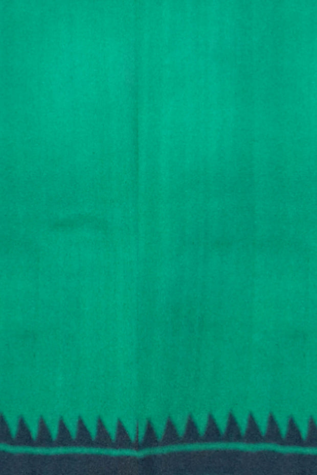 Printed pure silk saree in teal green with paisley motifs all over.