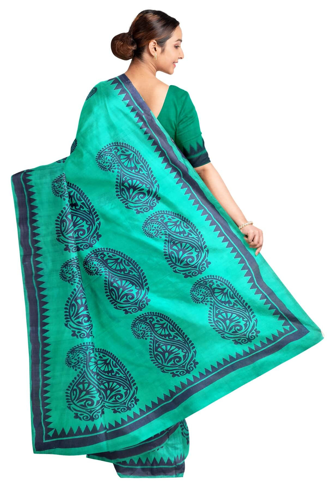 Printed pure silk saree in teal green with paisley motifs all over.