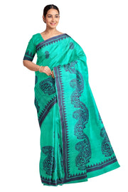 Printed pure silk saree in teal green with paisley motifs all over.