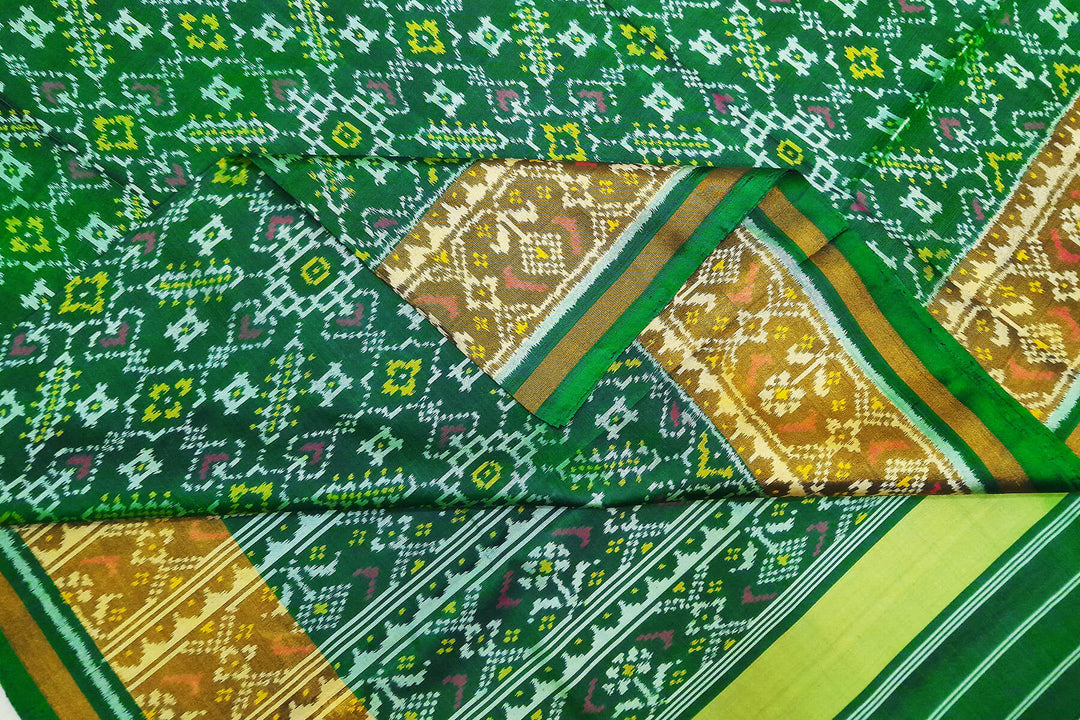 Handwoven Patola pure silk saree in  green in pan bhat pattern